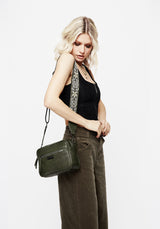 Portent Debossed Zip Front Crossbody Bag